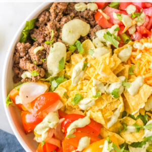 pinterest image for ground beef fajita taco salad
