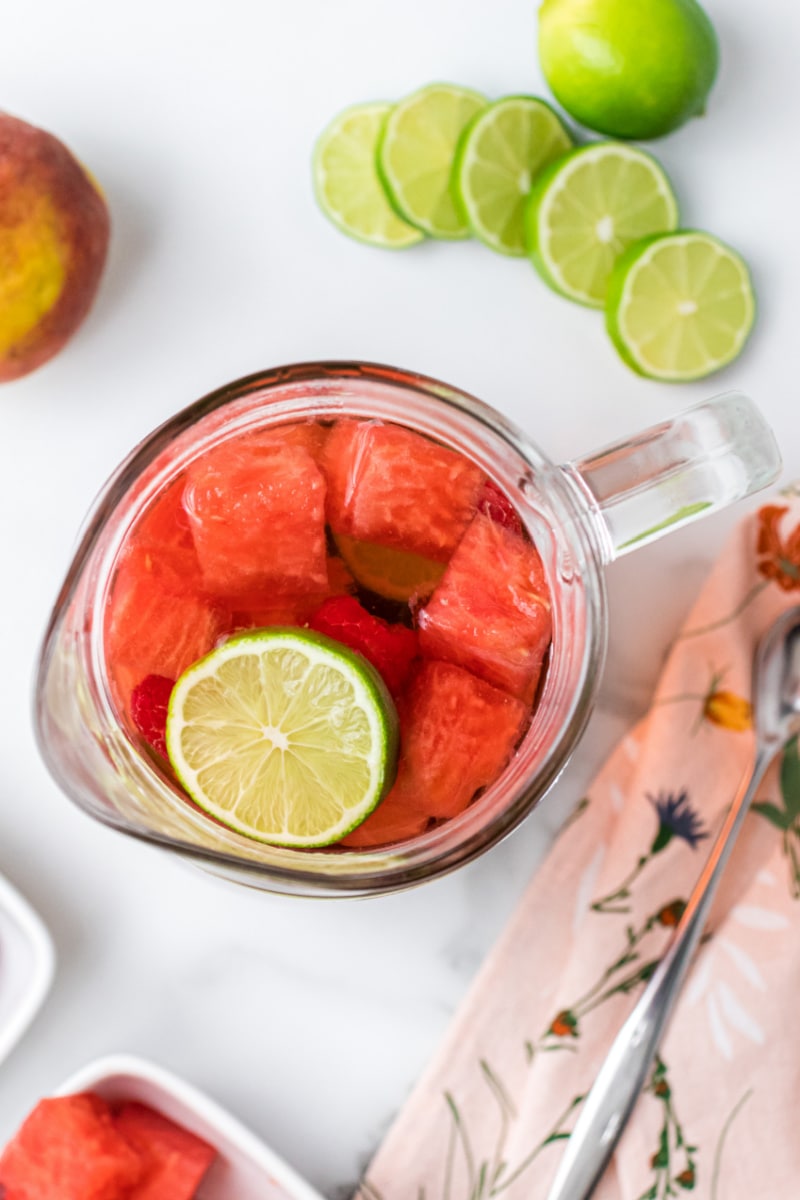 overhead shot into pitcher of rose sangria