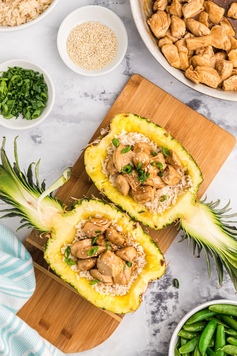 two teriyaki chicken pineapple bowls