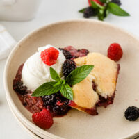 serving of blackberry raspberry cobbler on a plate
