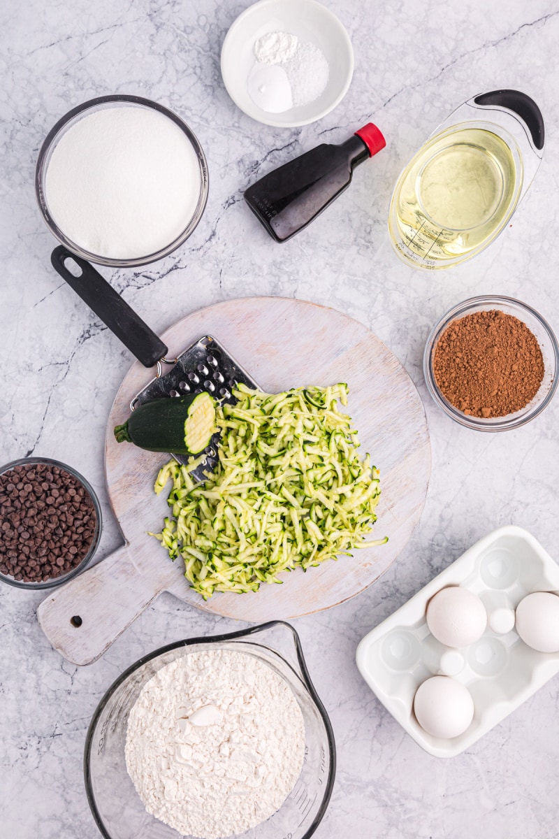 ingredients displayed for making chocolate zucchini bread