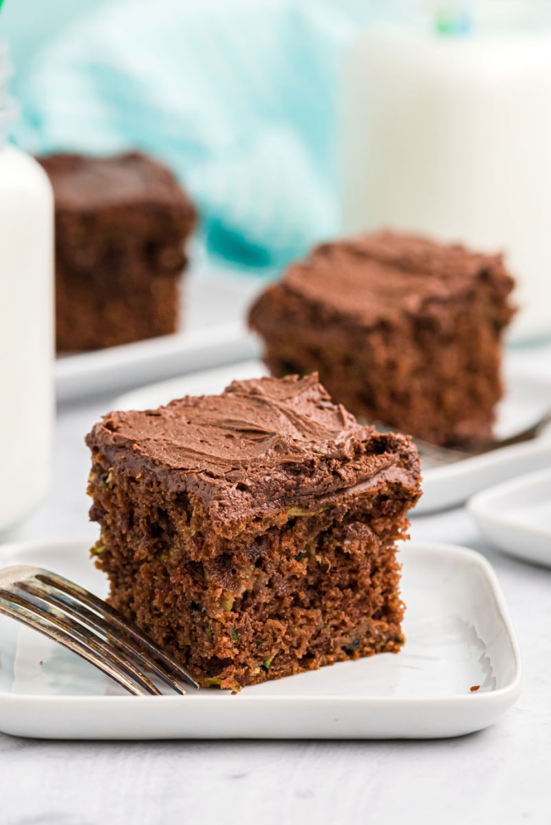 slices of chocolate cake on white plates