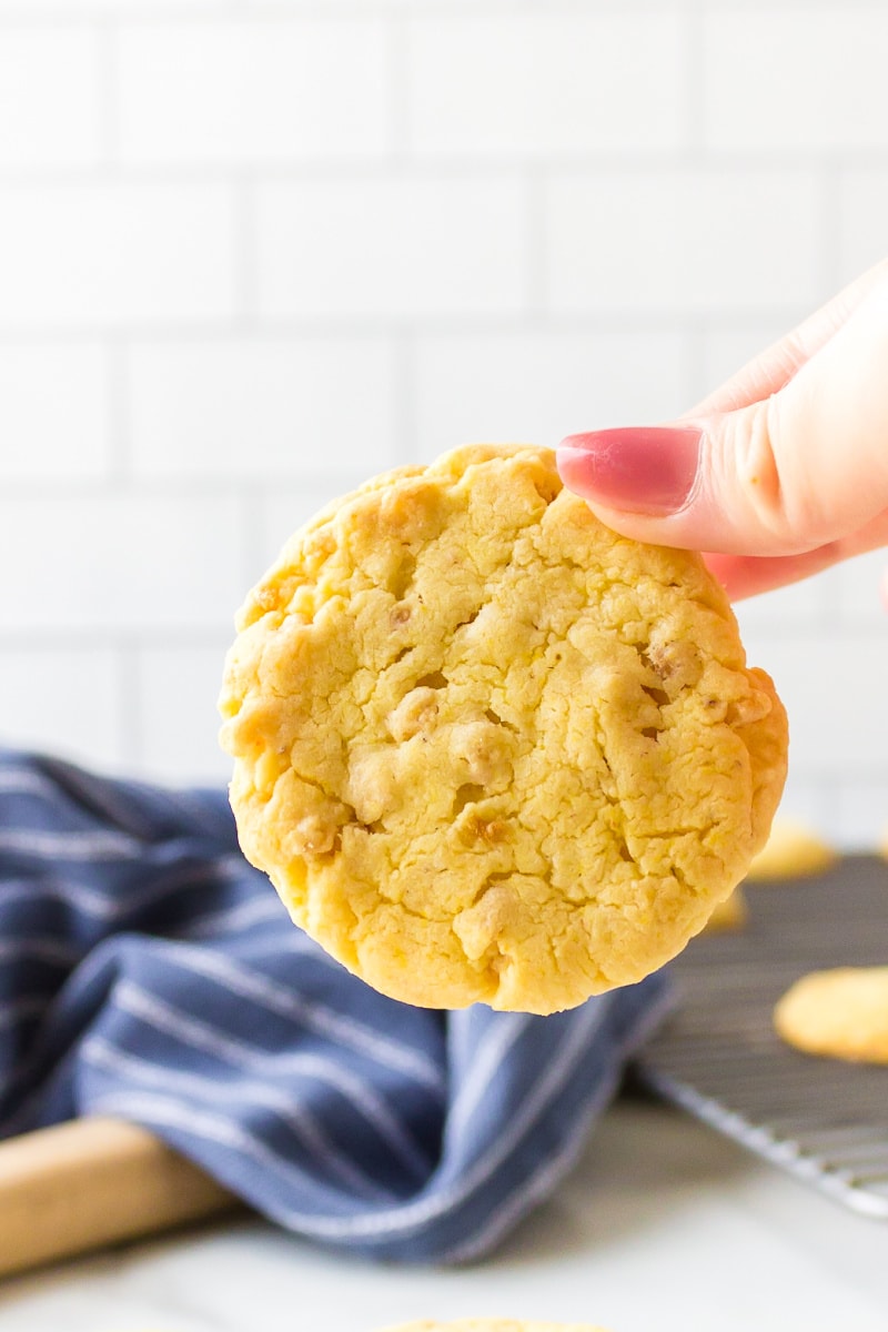 hand holding lemon cake mix cookie