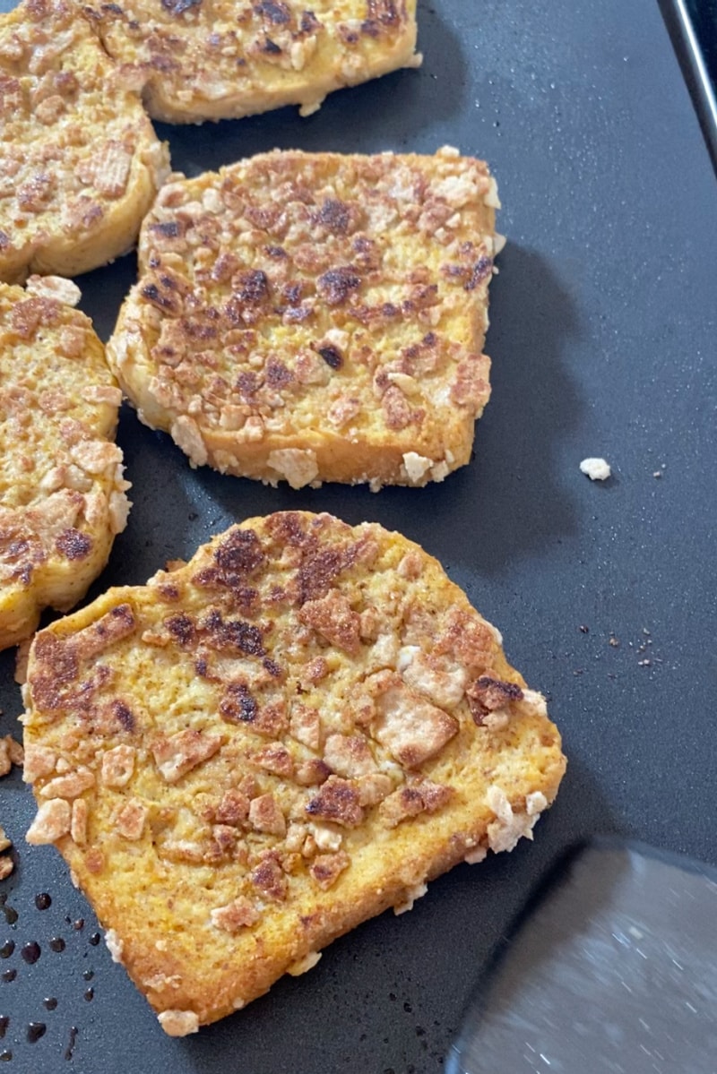 french toast cooking on a griddle