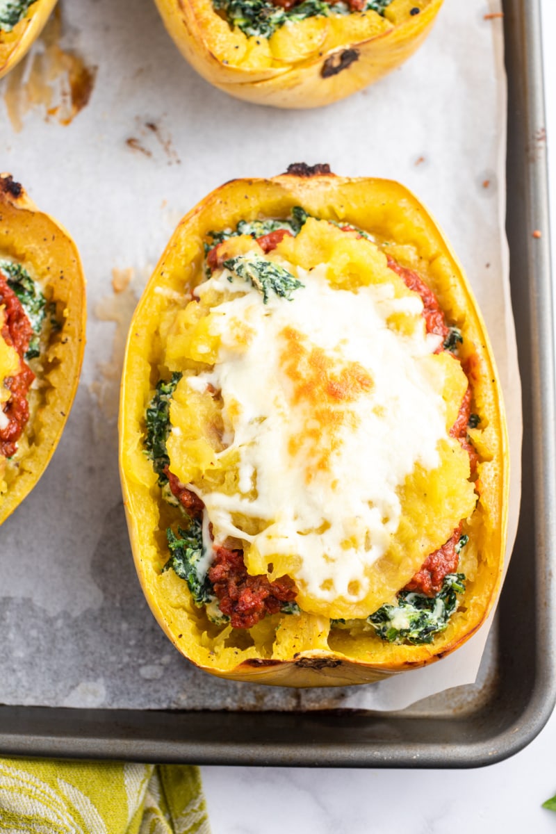 cheesy lasagna boat on baking sheet