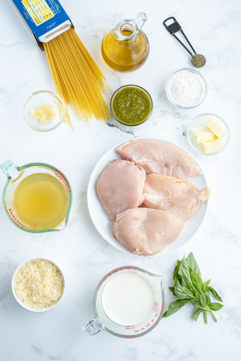 ingredients displayed for making creamy pesto chicken