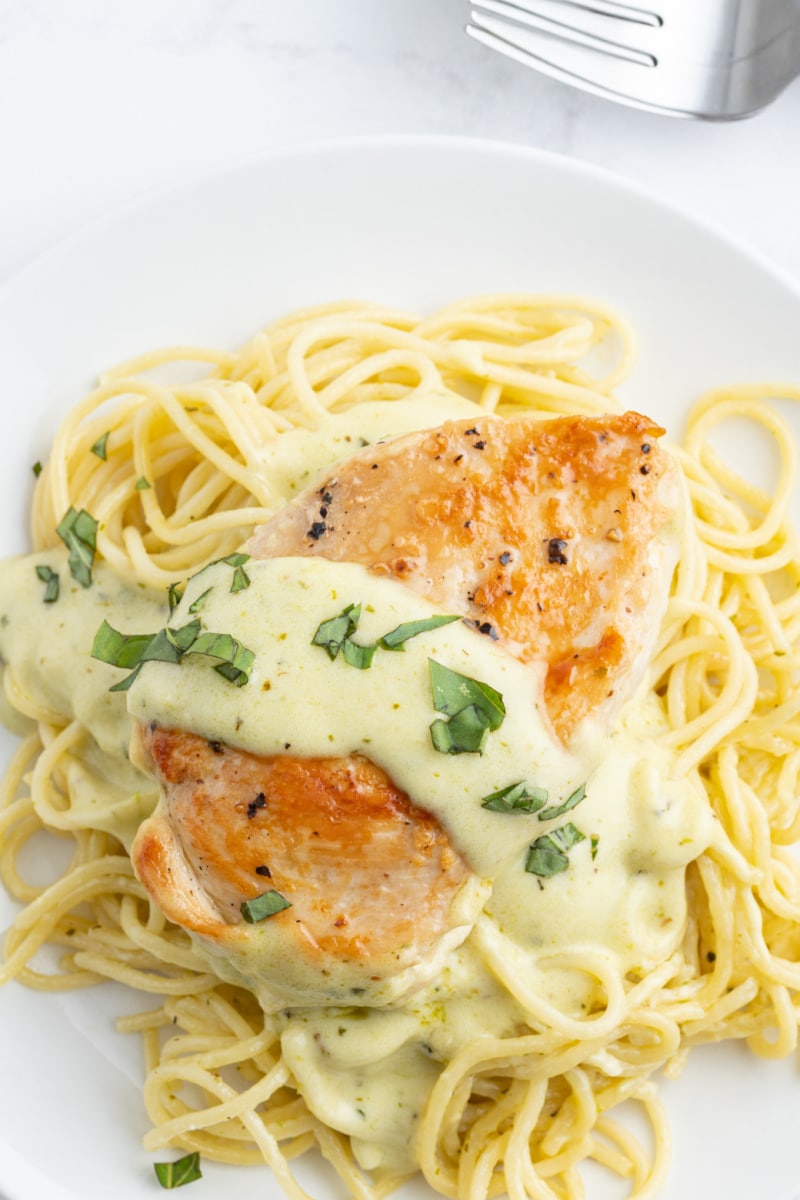 creamy pesto chicken over noodles