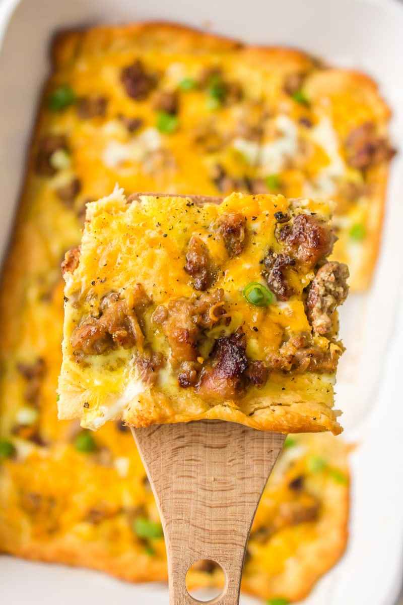 spatula holding piece of easy brunch casserole