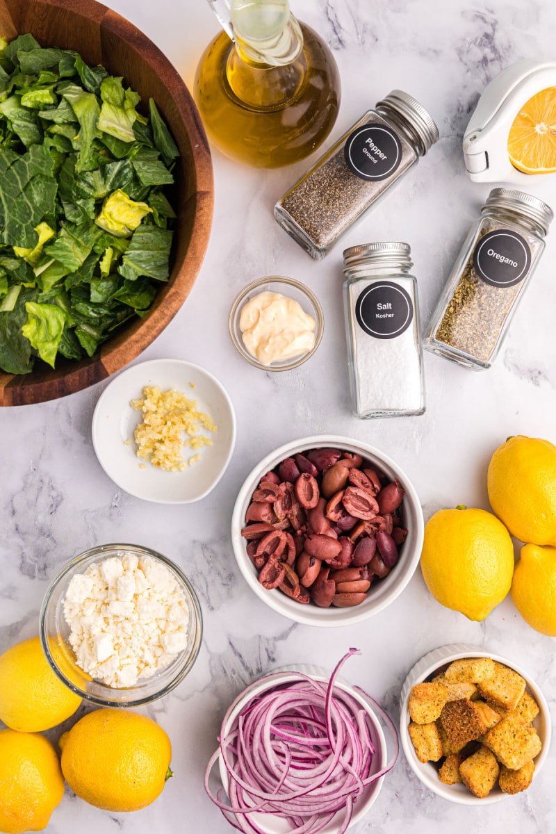 ingredients displayed for making greek caesar salad