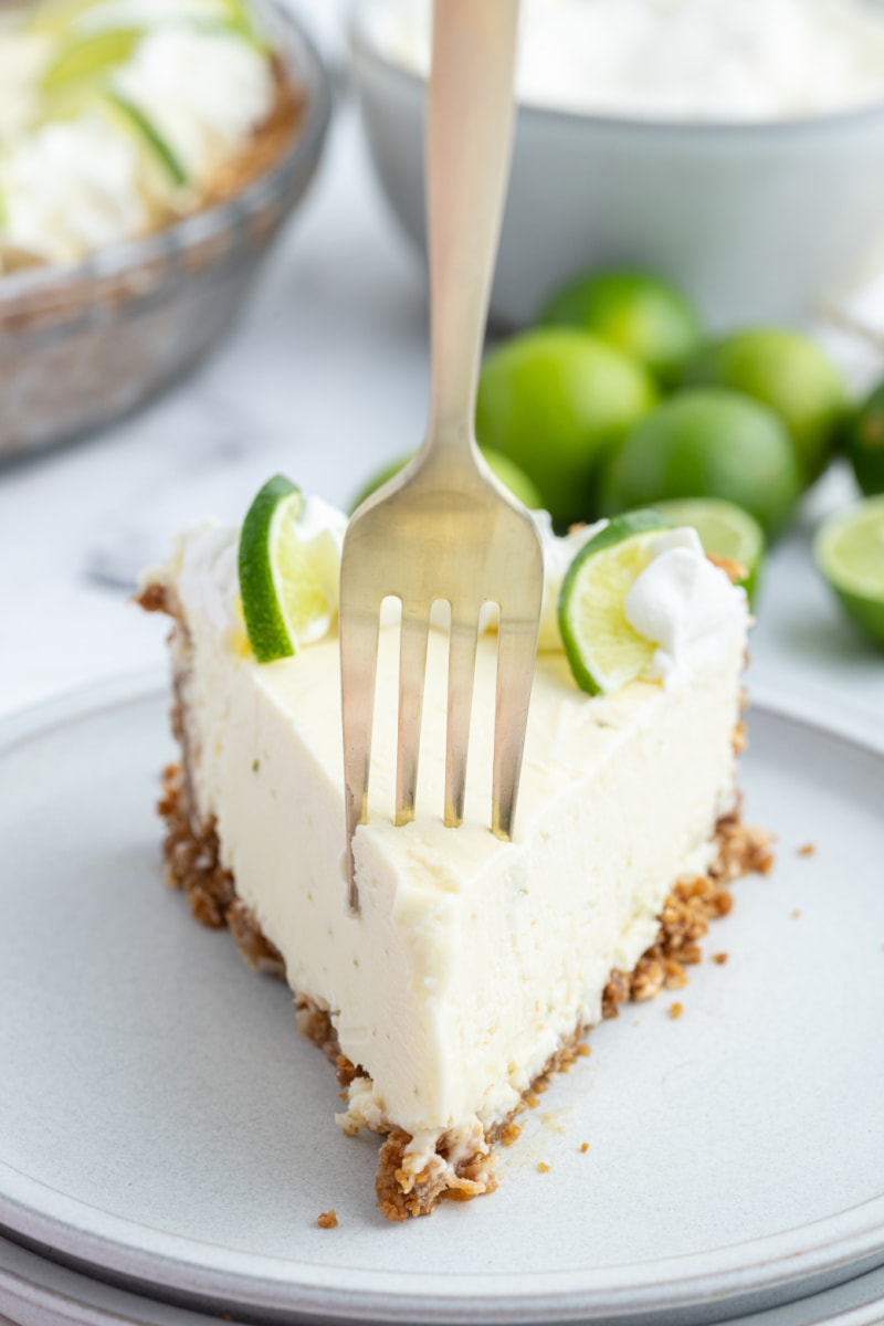 fork in slice of margarita key lime pie