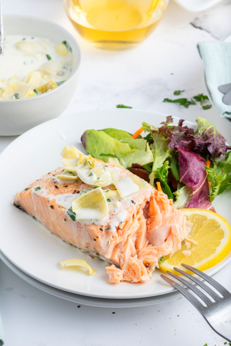 salmon fillet on plate flaked open
