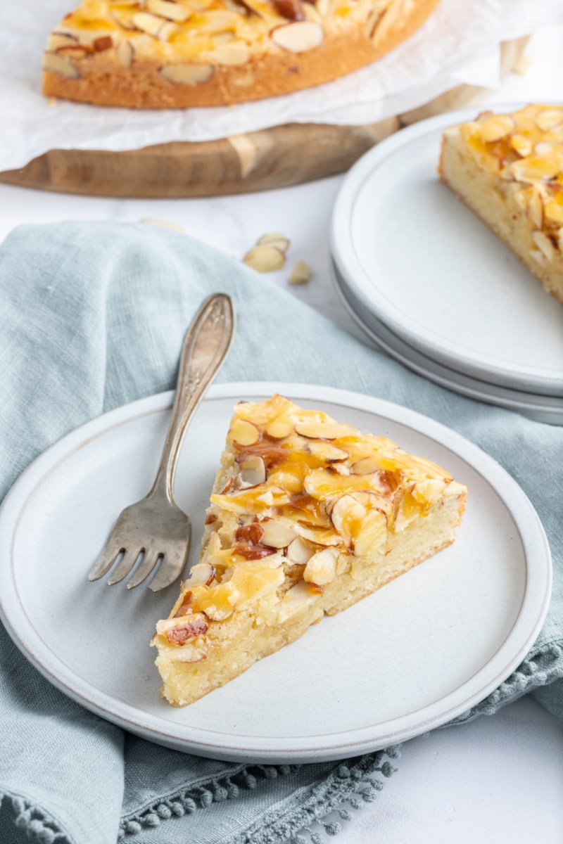 slice of french almond cake on a plate