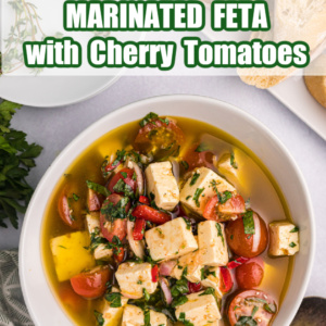 pinterest image for marinated feta with cherry tomatoes