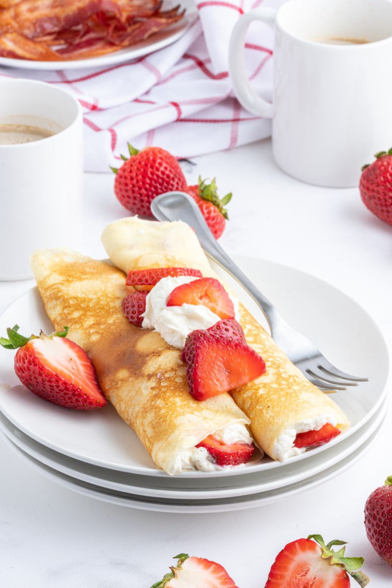 strawberry cream cheese crepes on plate