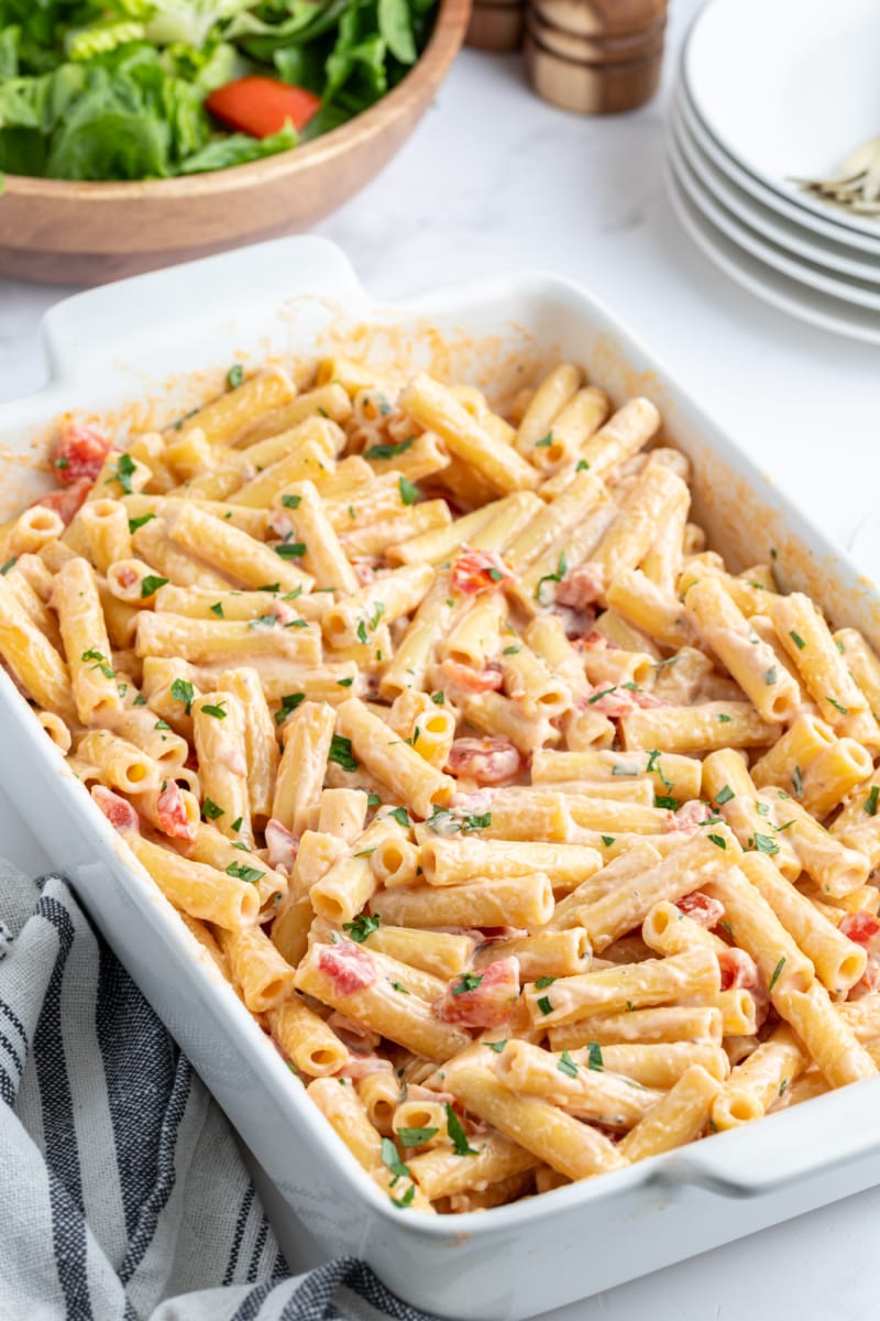 3 cheese baked ziti in a white casserole dish