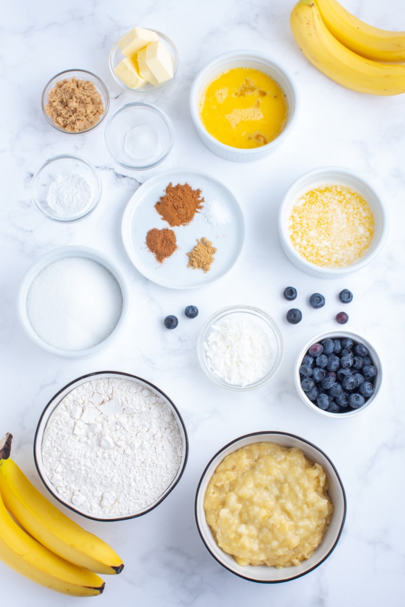 ingredients displayed for making blueberry coconut banana bread