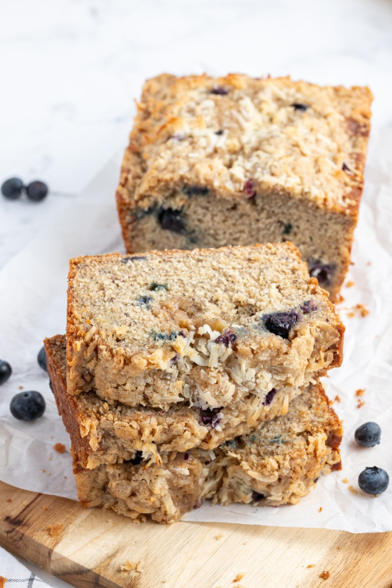 slices of coconut blueberry banana bread stacked