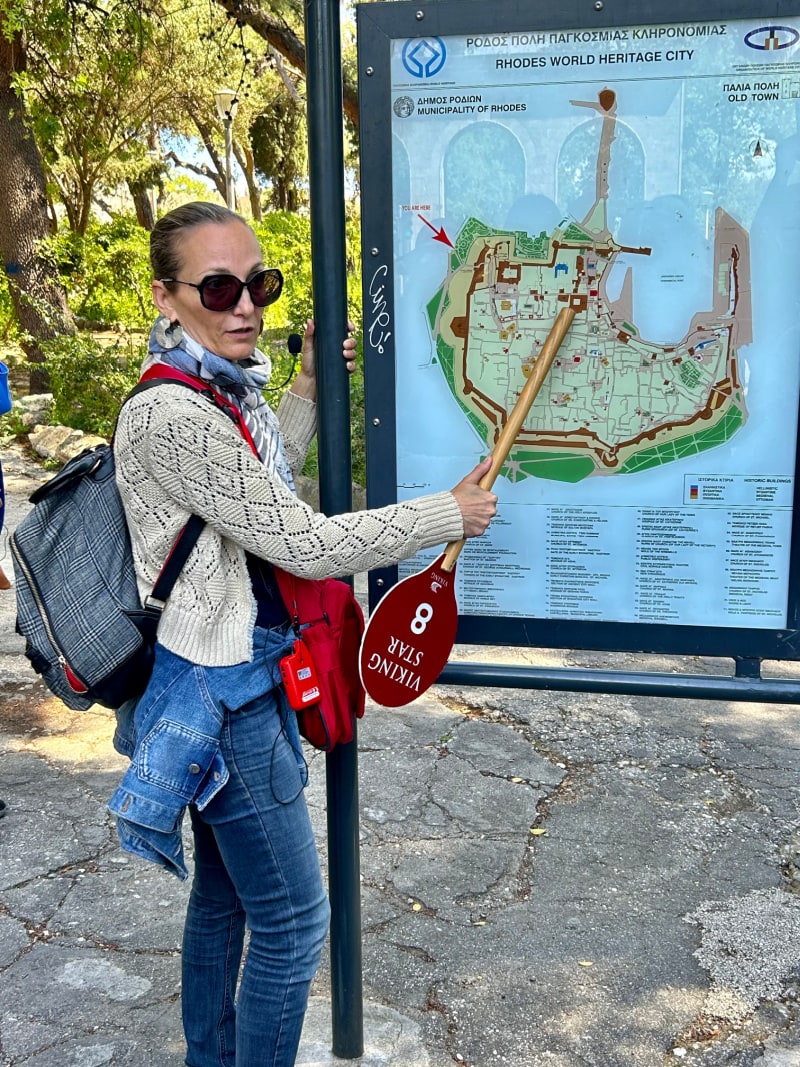 tour guide showing map in Rhodes