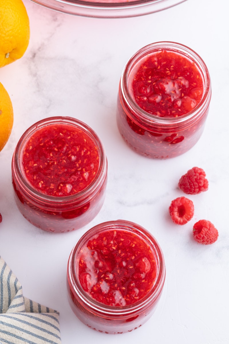 three jars of raspberry orange freezer jam 