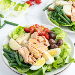 salmon nicoise salad on a plate