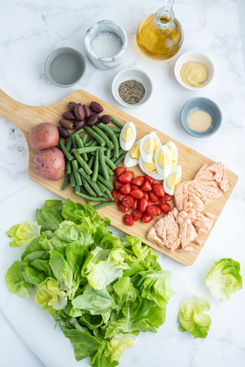 ingredients displayed for making salmon nicoise salad