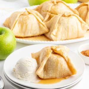 apple dumpling on plate with ice cream