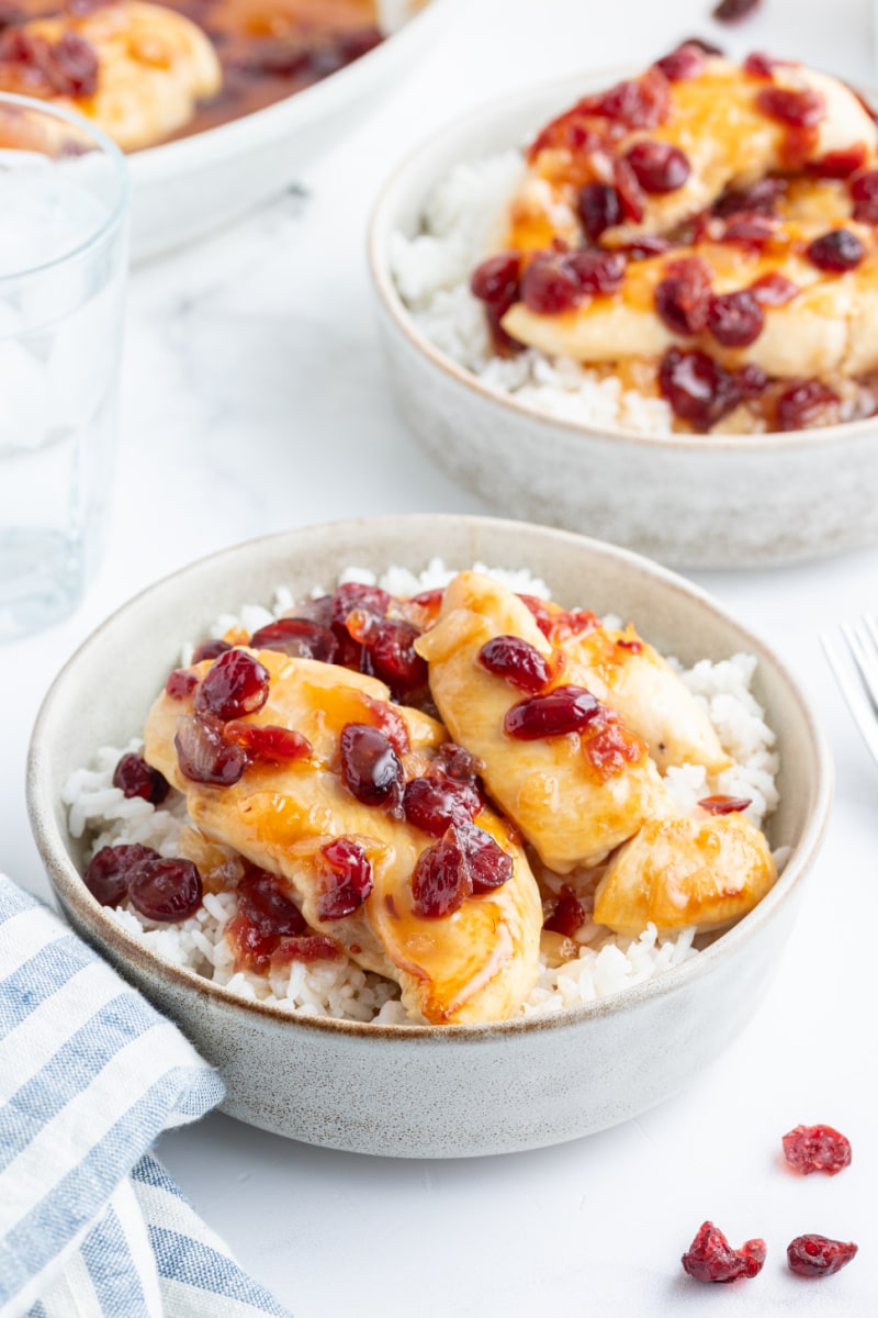 apricot cranberry chicken in a bowl with rice