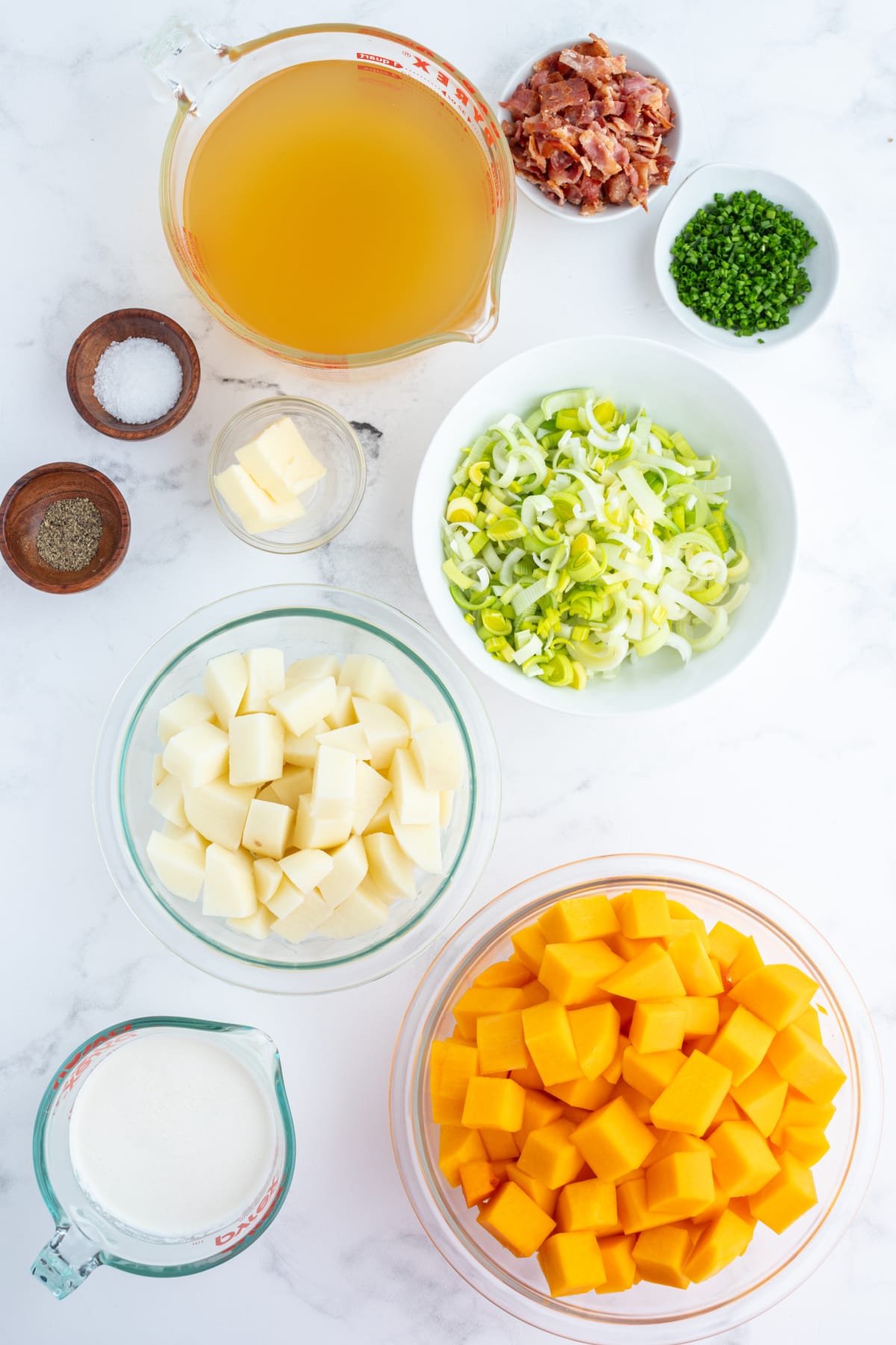 ingredients displayed for making butternut squash and potato soup