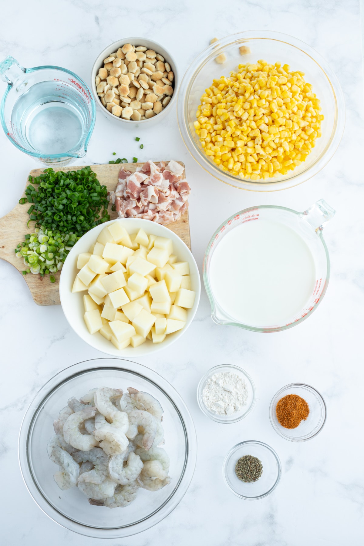 ingredients displayed for making corn and shrimp chowder