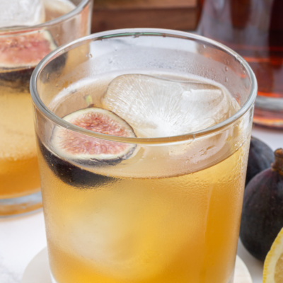 fig old fashioned in a cocktail glass