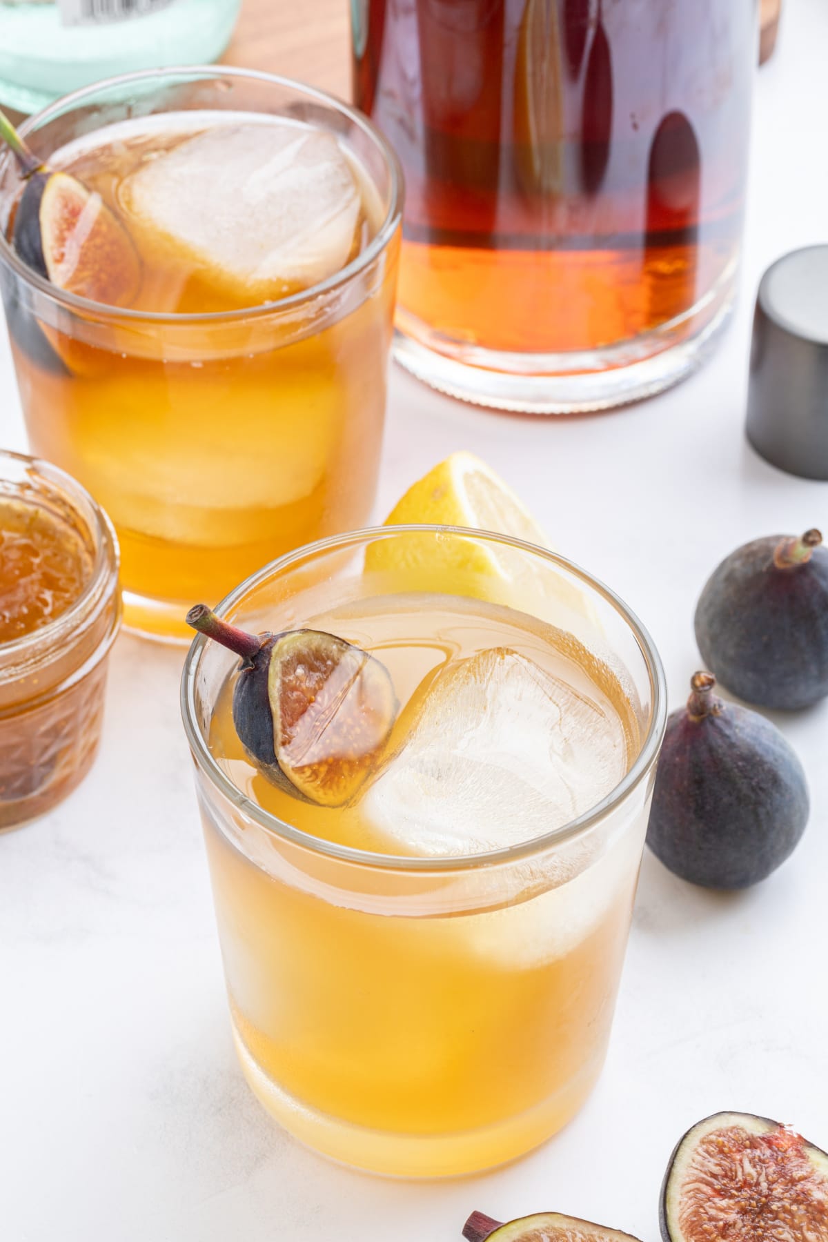fig old fashioned in cocktail glasses