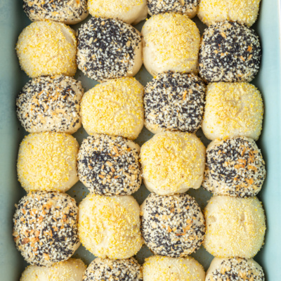 checkerboard dinner rolls in a baking pan