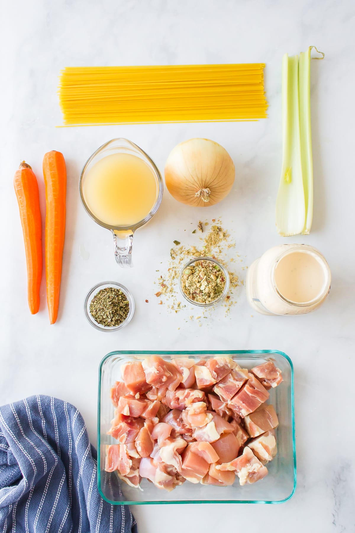 ingredients displayed for making chicken alfredo soup