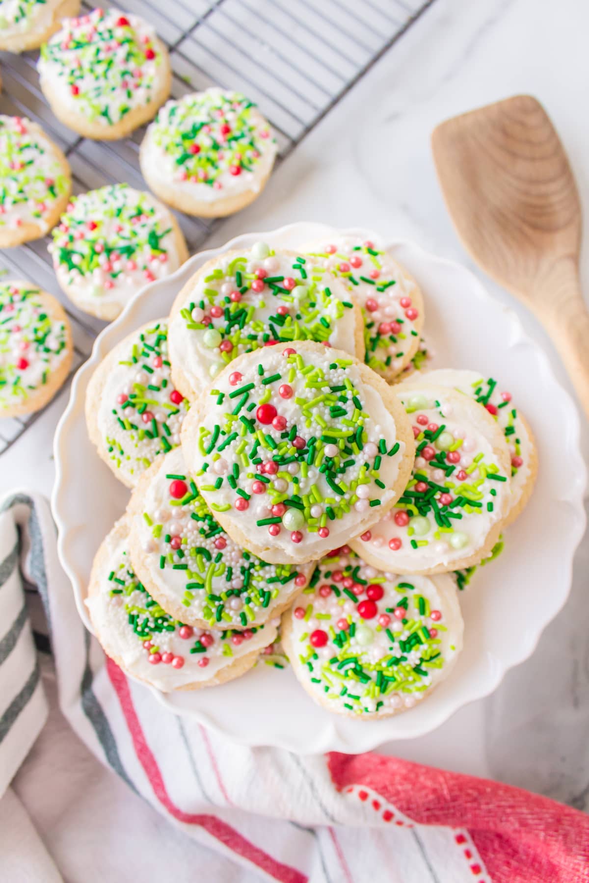 stack of christmas lofthouse cookies on platter