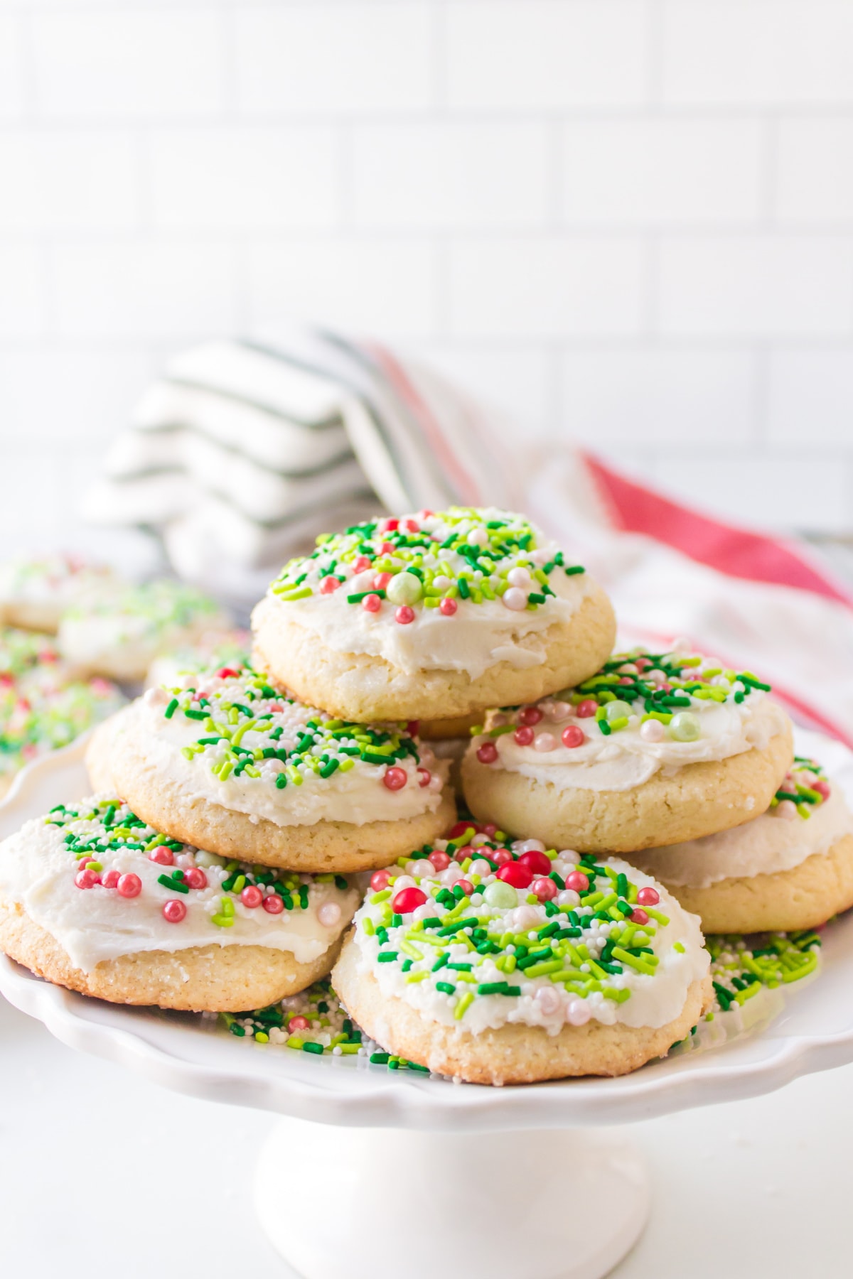 stack of christmas lofthouse cookies on platter