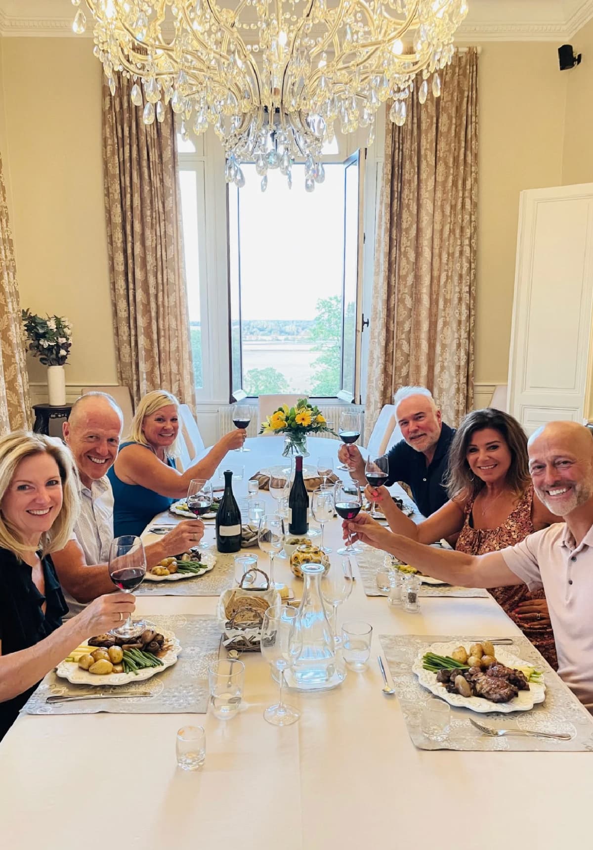 dinner at dining table of chateau de valcreuse