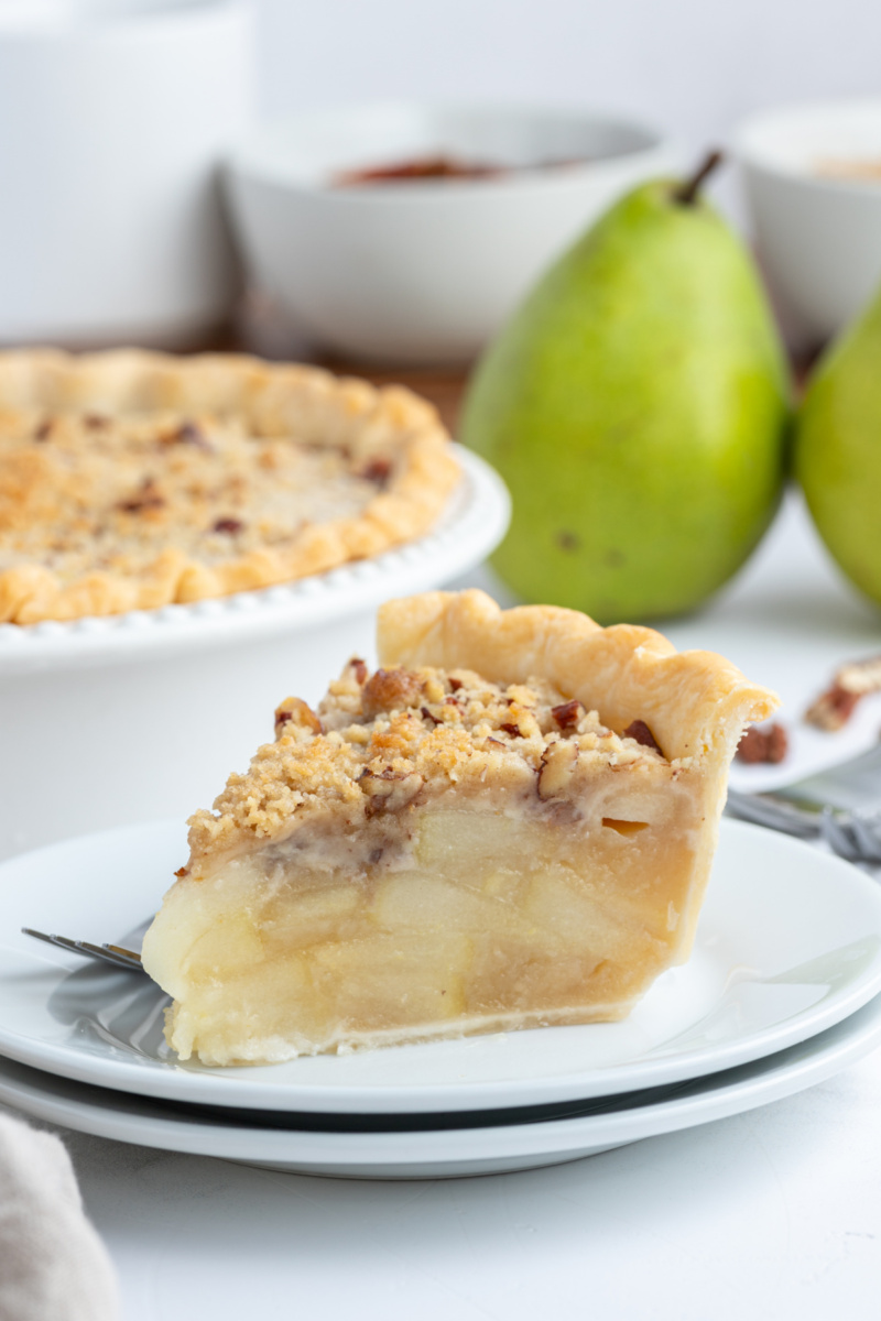 slice of ginger pear pie on a plate