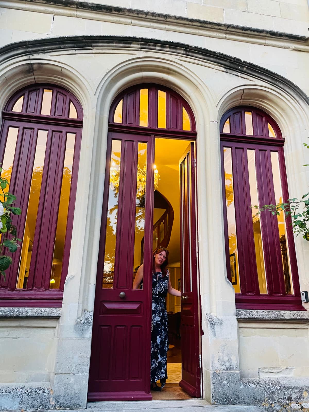 laura welcoming us at door to chateau de valcreuse