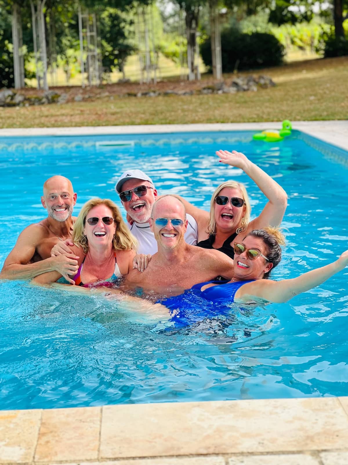 pool photo of group staying at chateau de valcreuse