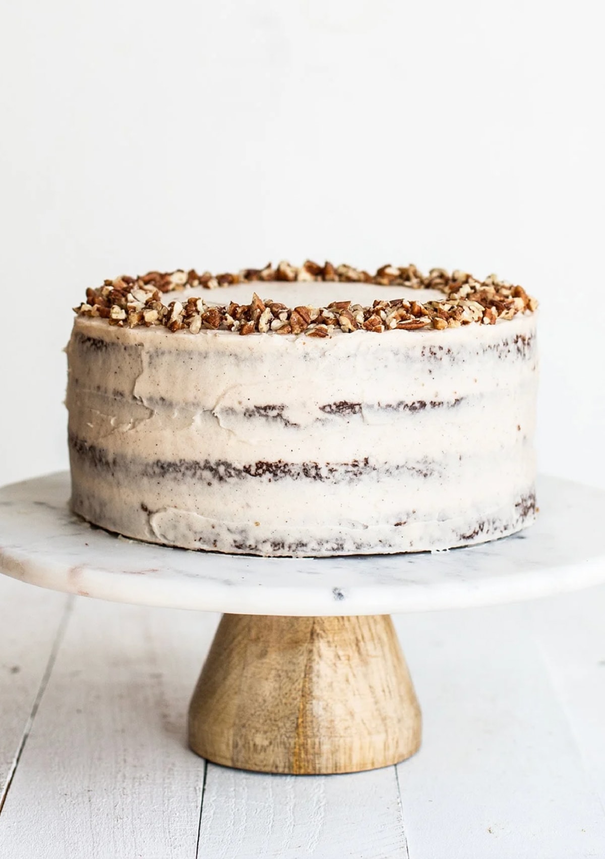 brown butter carrot cake on cake platter