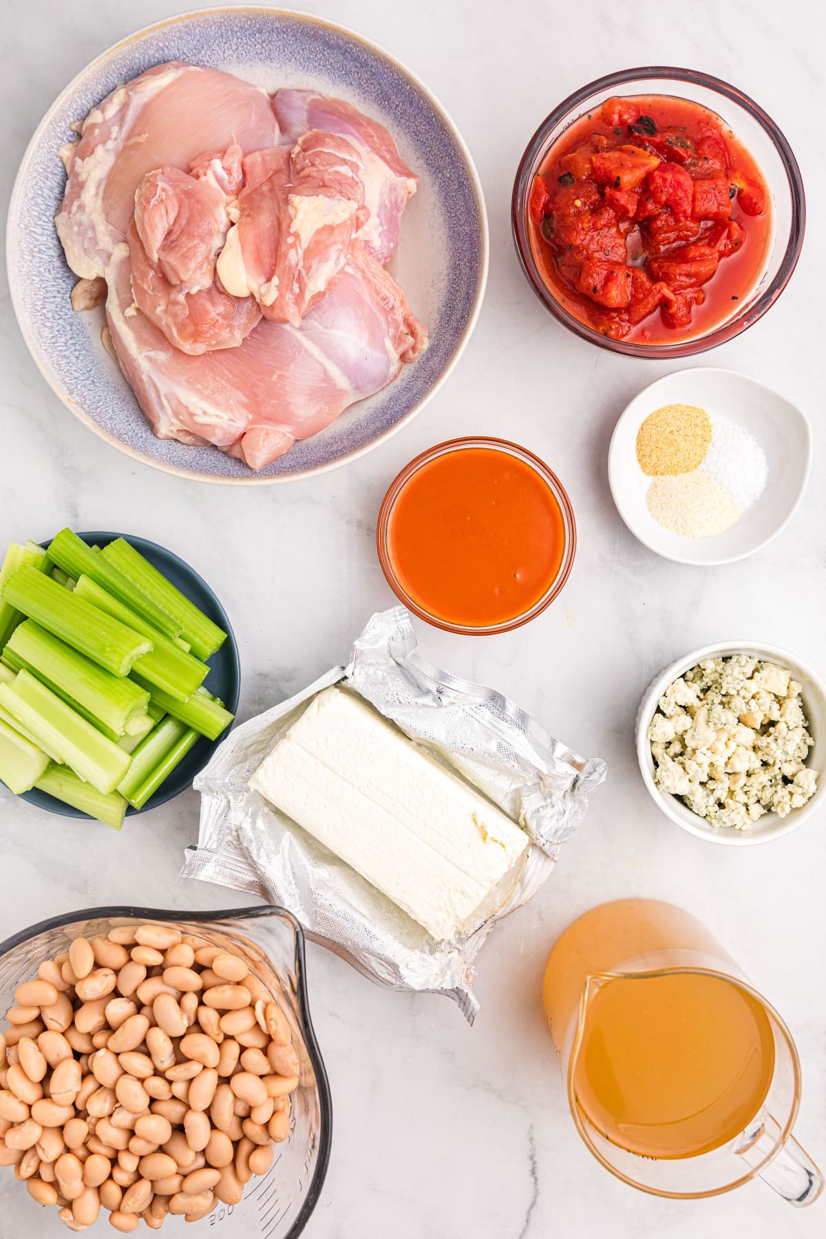 ingredients displayed for making buffalo chicken soup