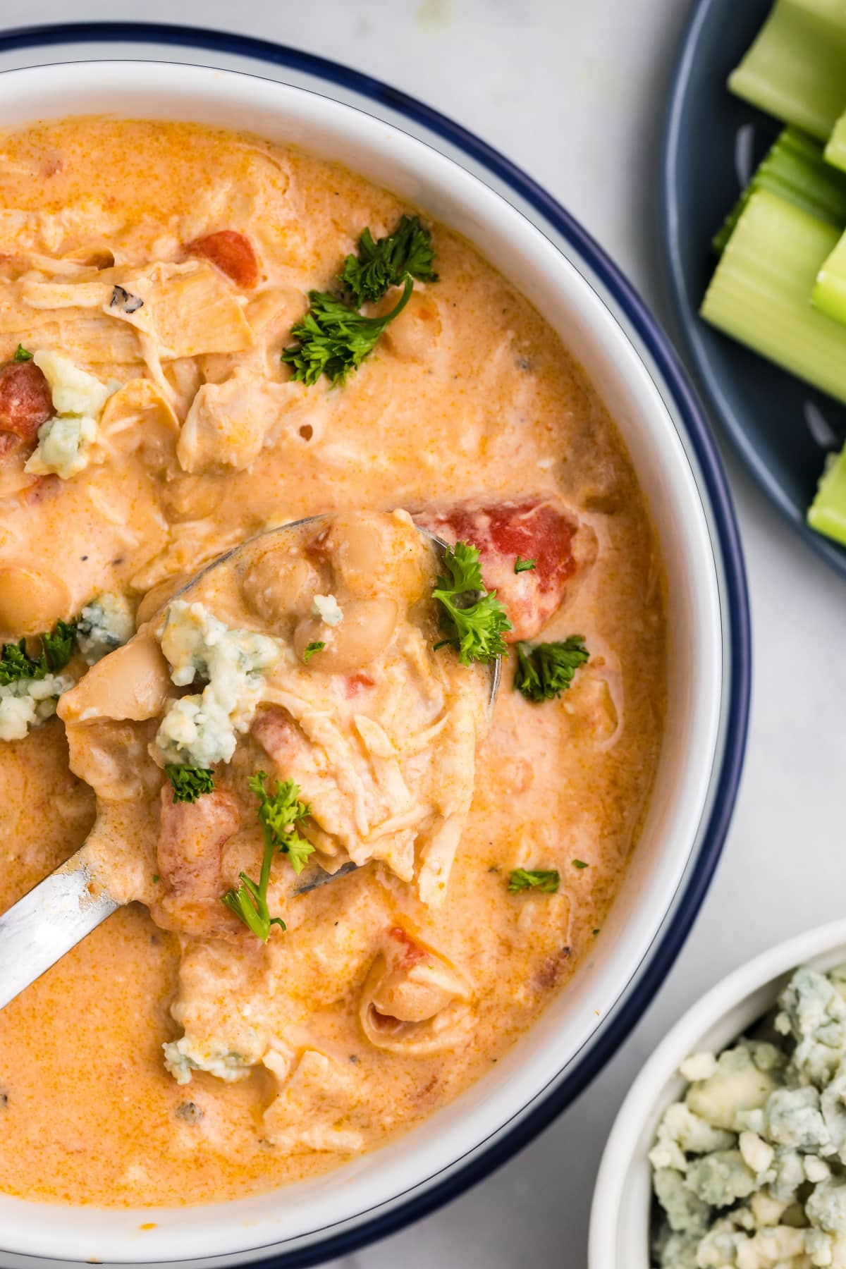 half shot of buffalo chicken soup in bowl