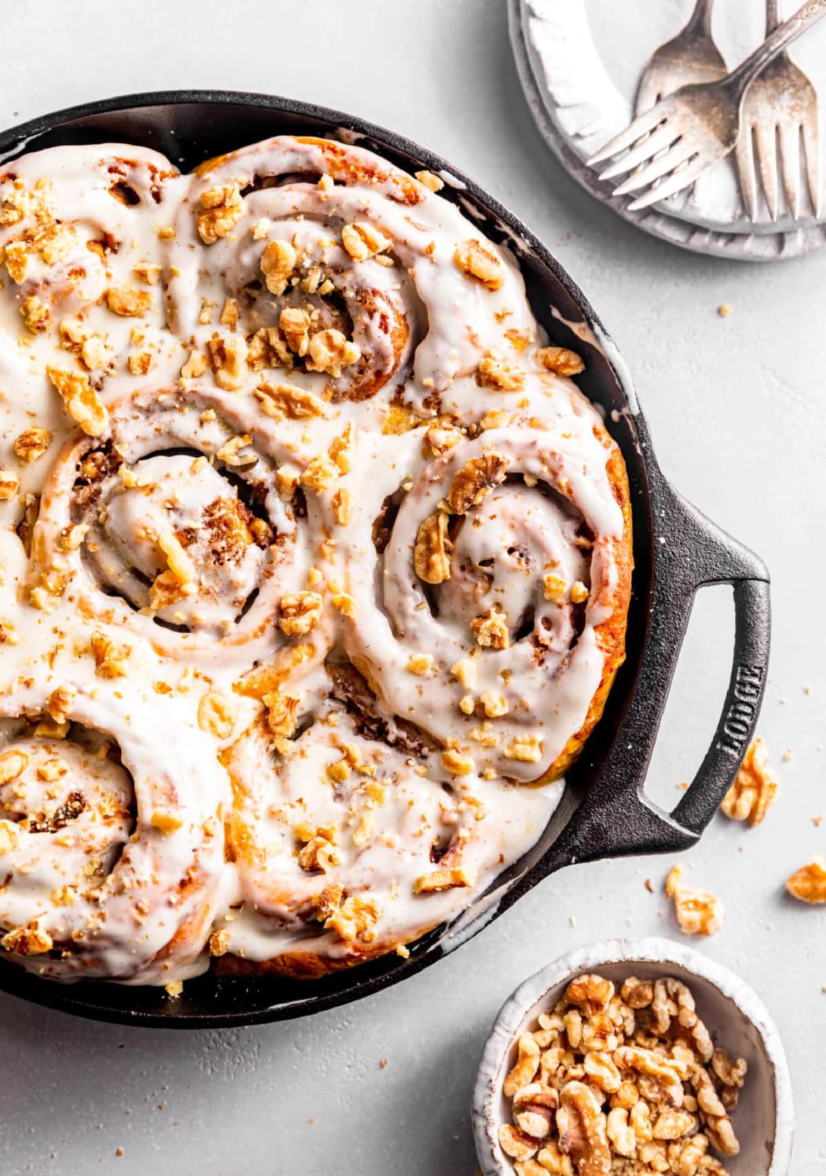 carrot cake cinnamon rolls in pan