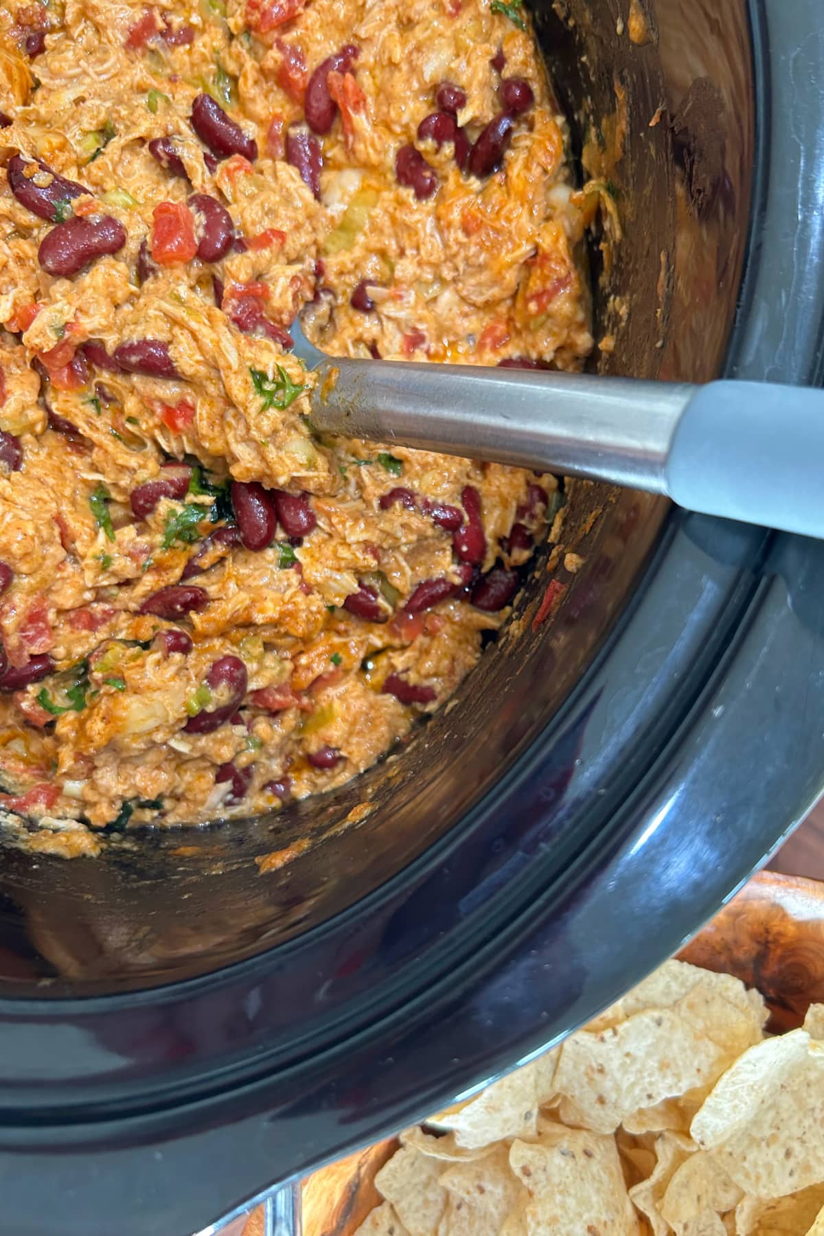 slow cooker chicken taco dip in slow cooker insert