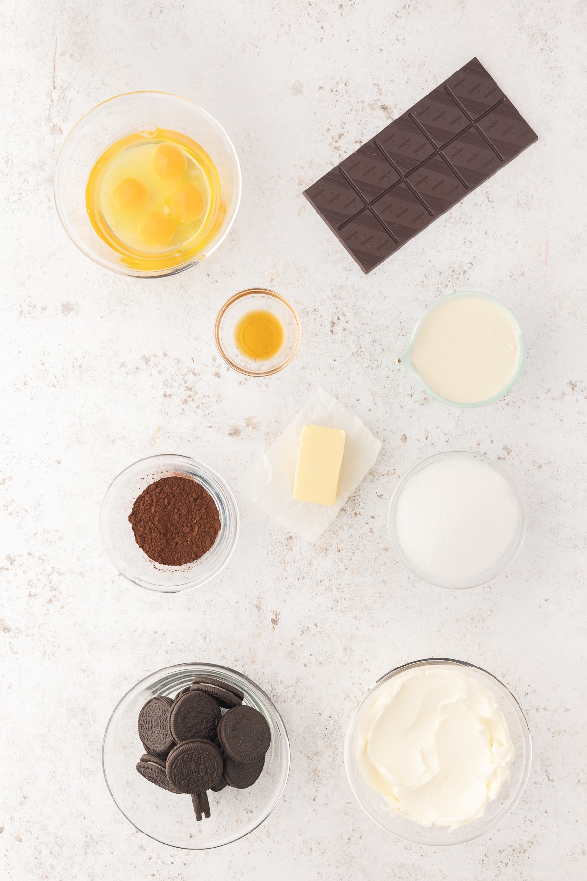 ingredients displayed for making chocolate cheesecake bars