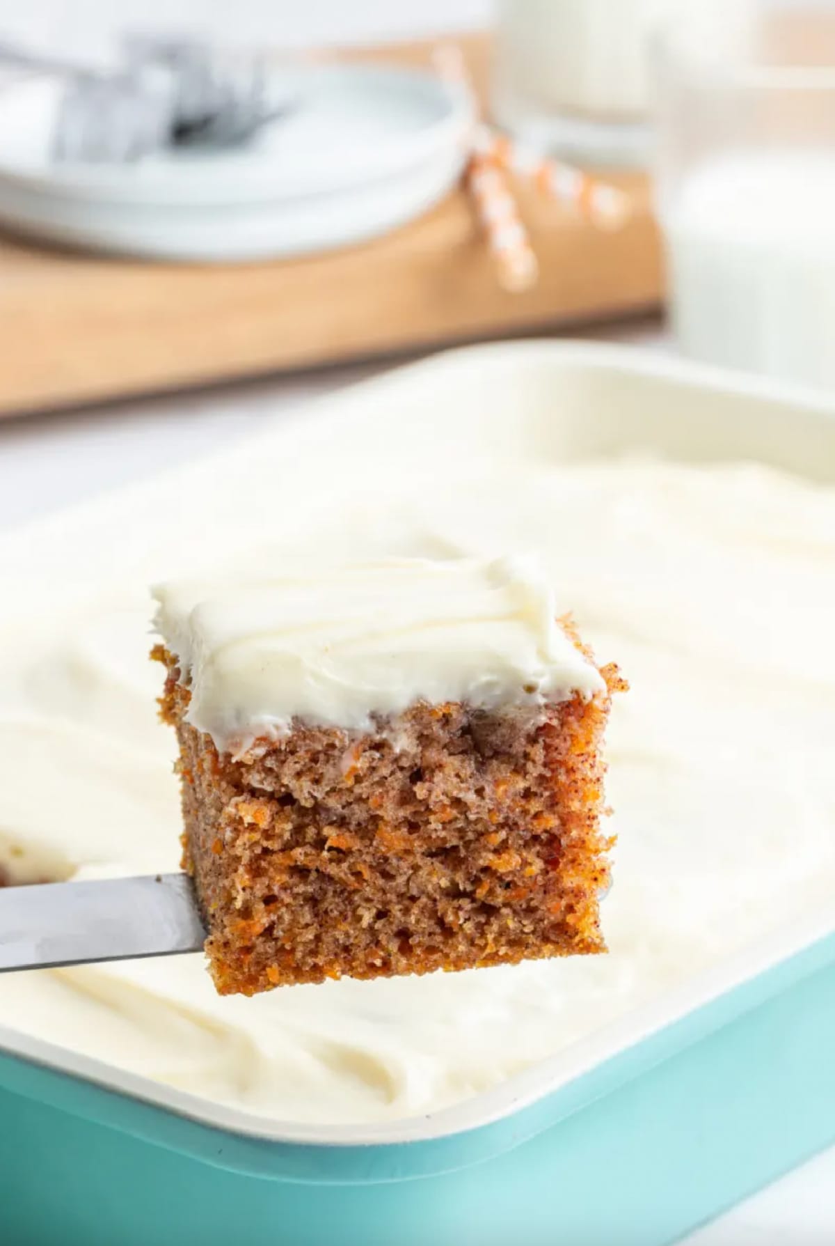 slice of great grandma's carrot cake on spatula