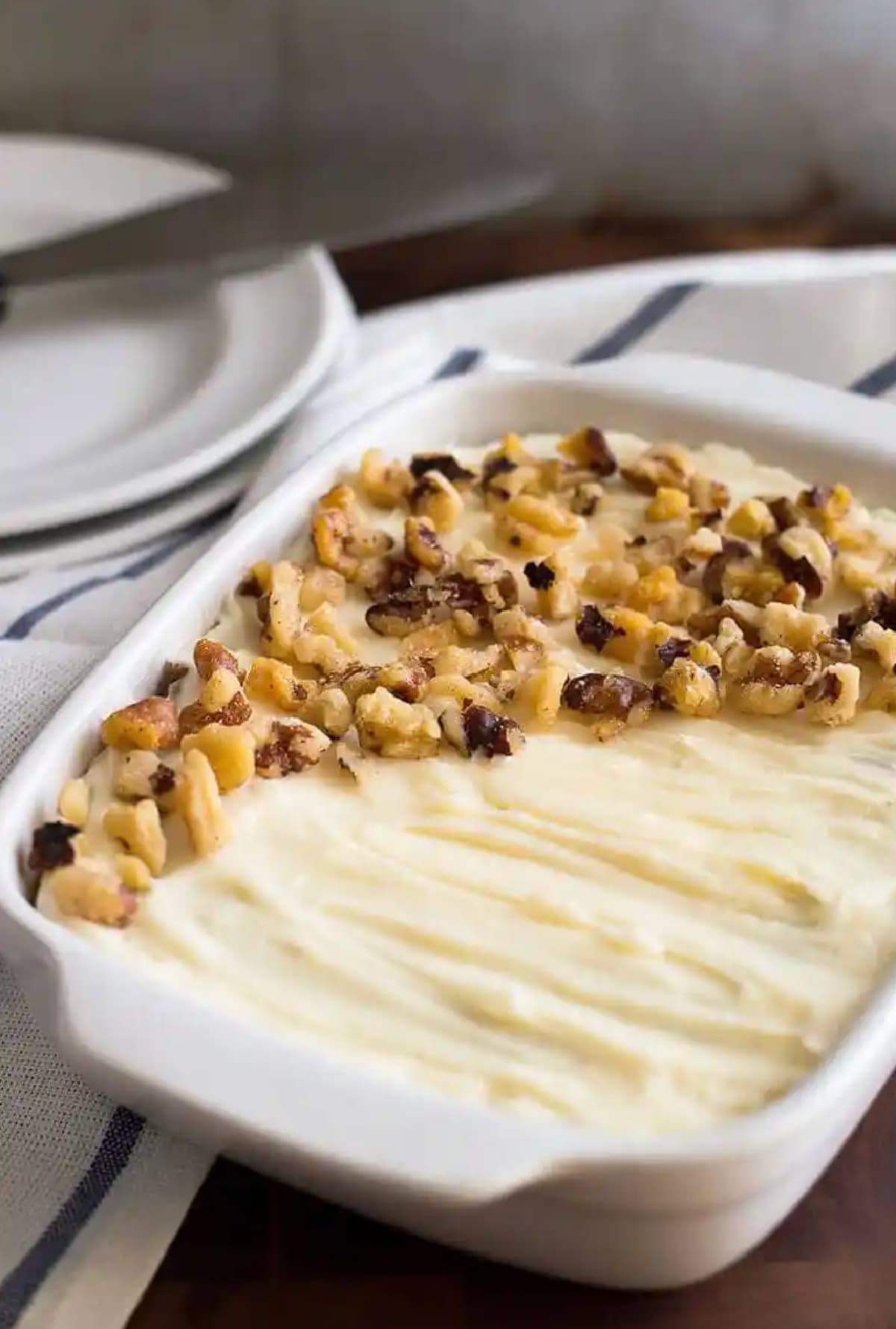 small carrot cake in baking pan