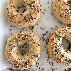 almond flour bagels on baking sheet with everything bagel seasoning