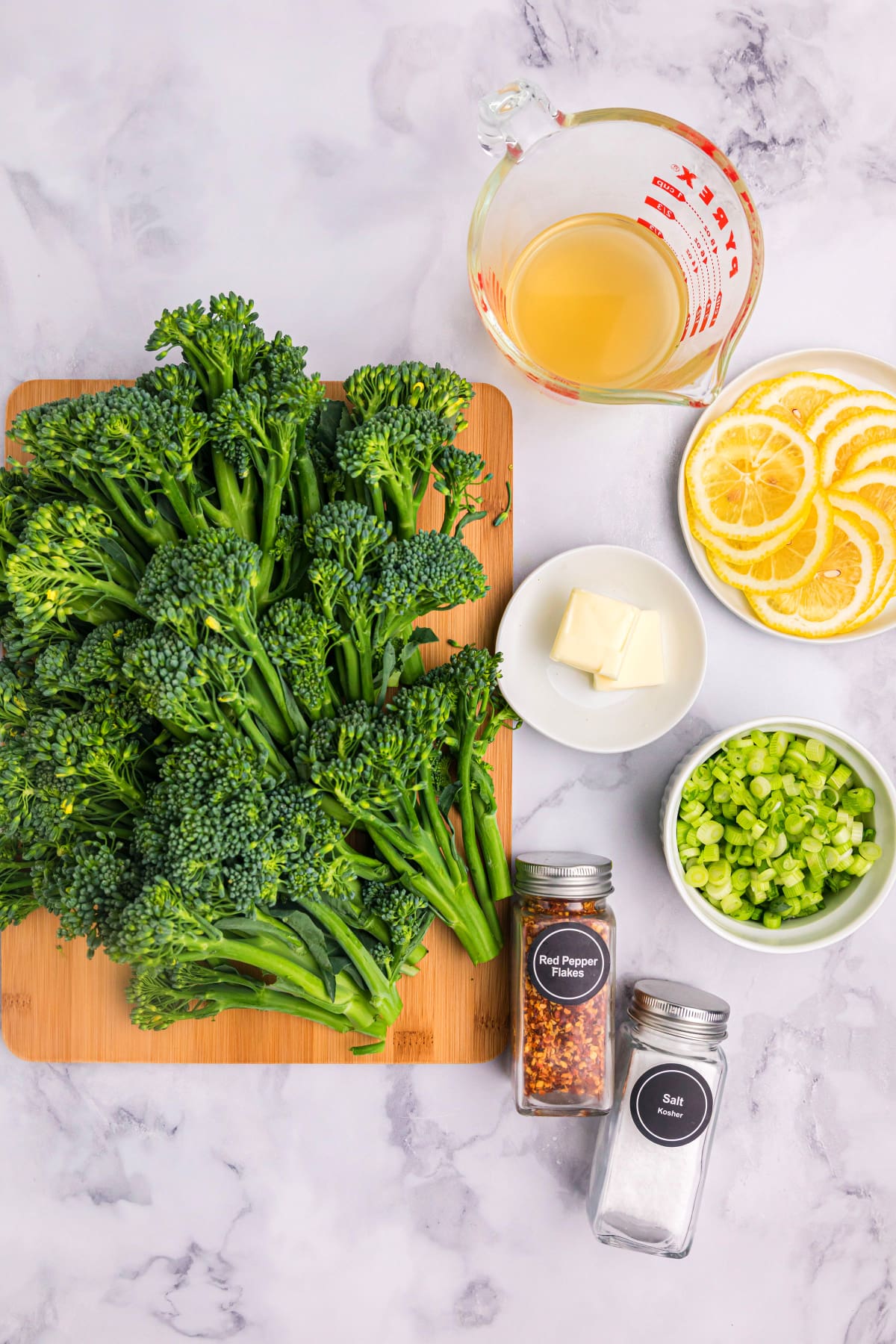 ingredients displayed for making lemon broccolini