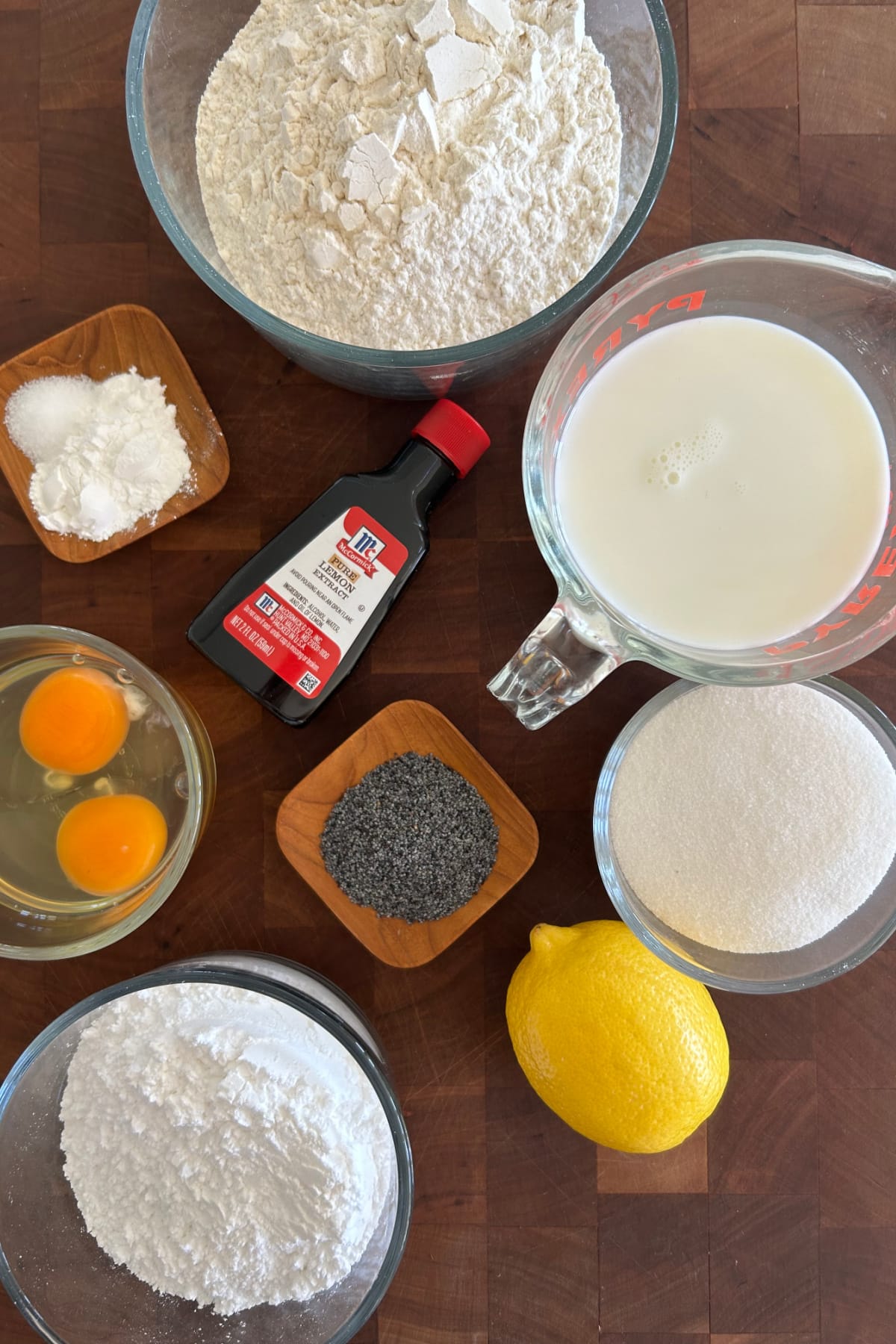 ingredients displayed for making lemon poppy seed muffins